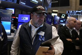 الأسهم الأمريكية تشهد تداولات متقلبة في انتظار تقارير أرباح